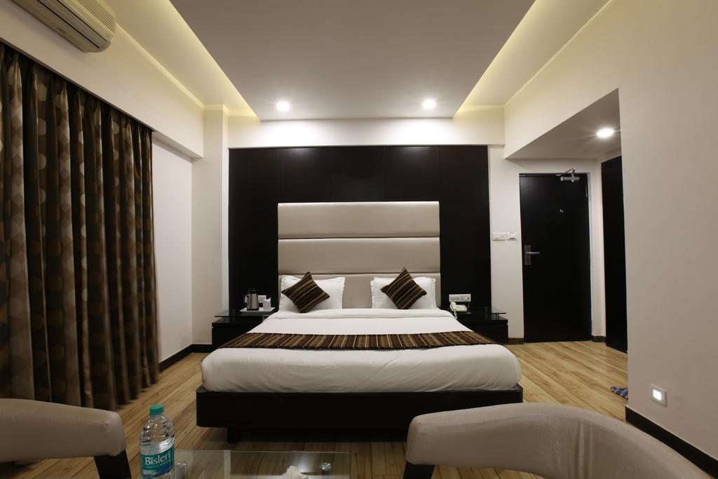 Celestia The Hotel Ahmedabad Habitación foto